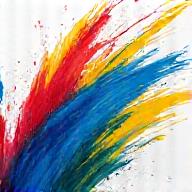 Éclaboussures de peinture colorées sur une toile blanche